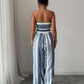 👗50% OFF NOW!💥Geometric Jumpsuit with Halter Neckline & Side Slit – Unique print & elastic back – Versatile, perfect for summer parties or resort wear ✨